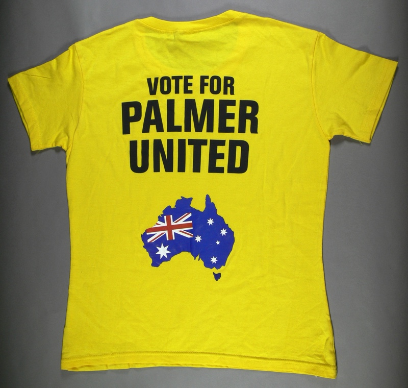 A yellow t-shirt with the words 'Vote for Palmer United' and a silhouette of Australia coloured with the Australian flag.