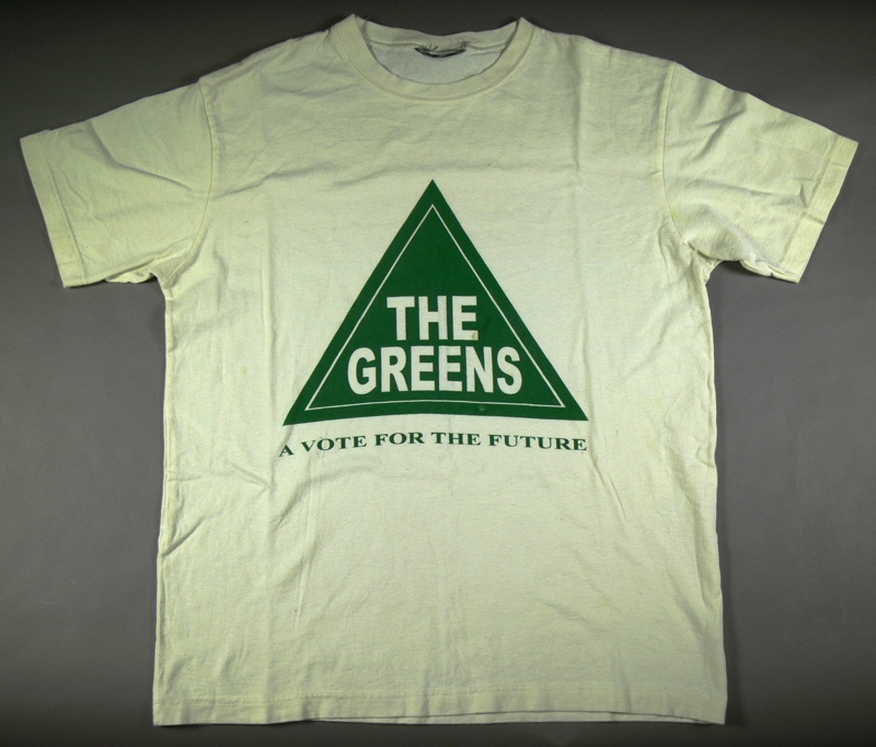 A white t-shirt with a triangle Greens logo and the words 'a vote for the future'.