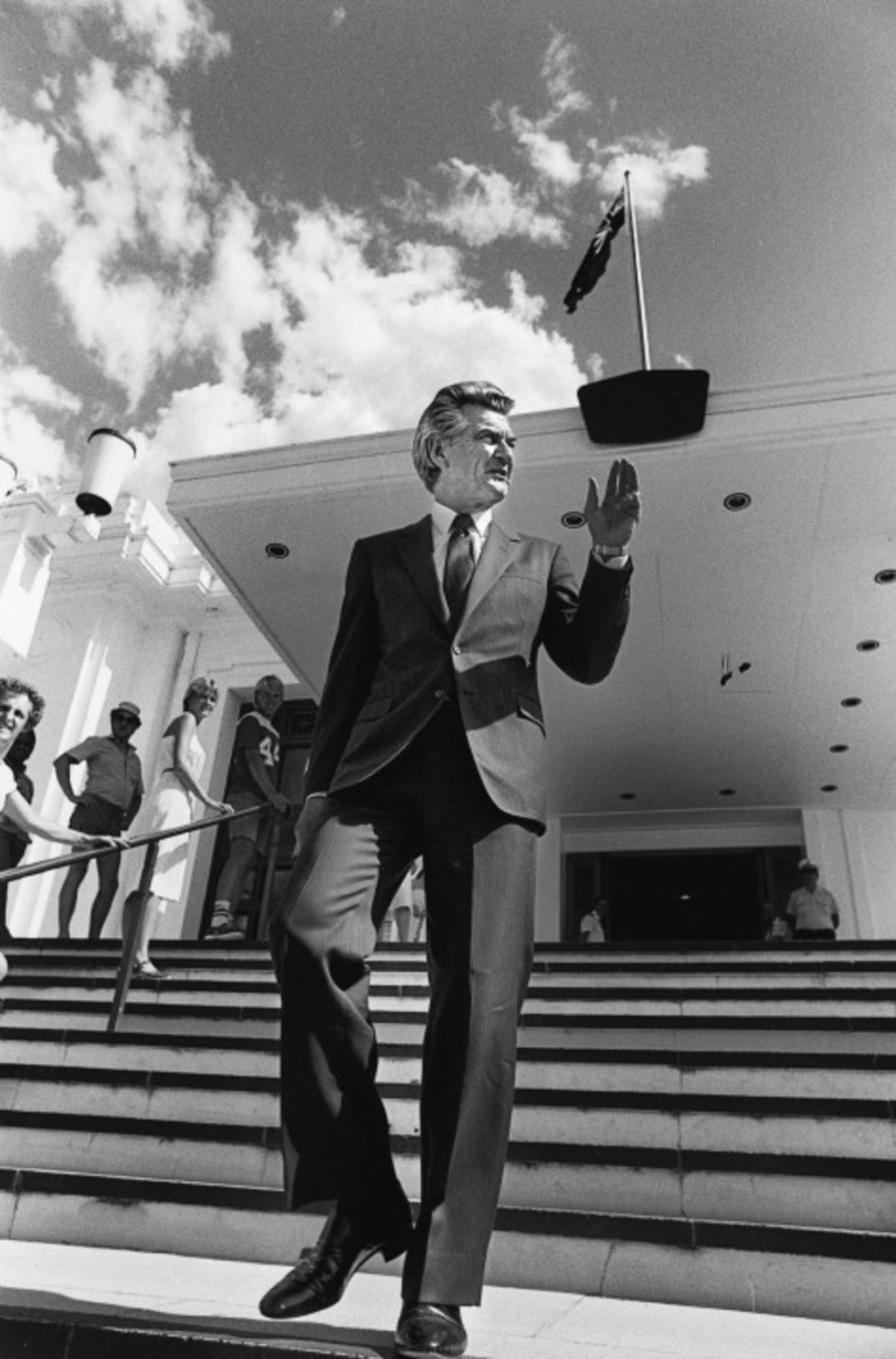 A buoyant Prime Minister-elect Bob Hawke acknowledges well-wishers on the steps of Parliament House