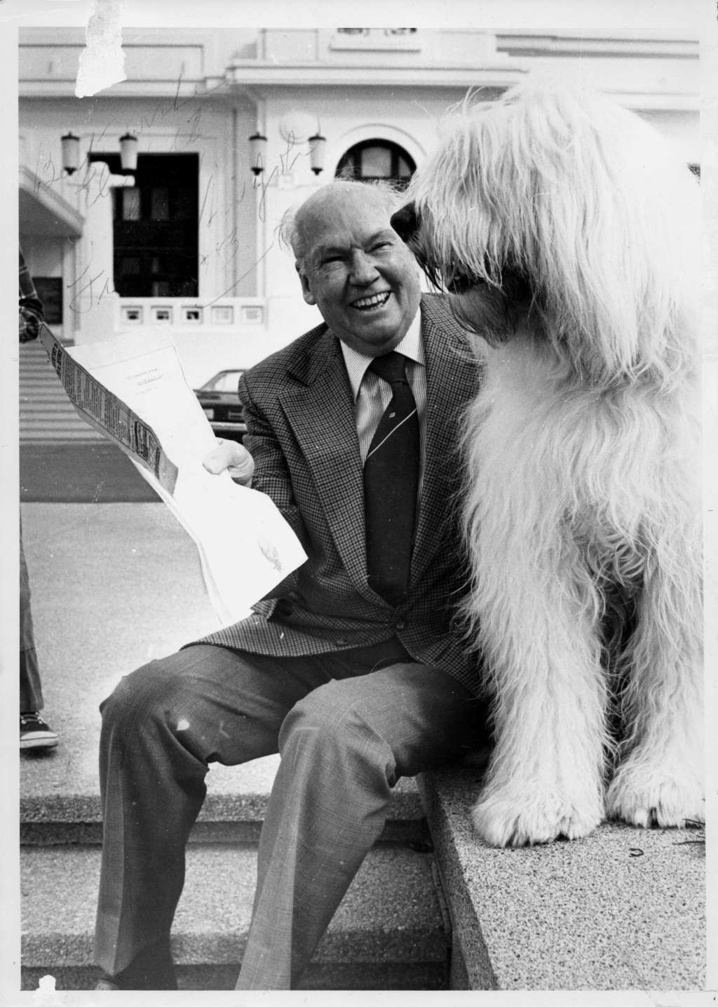 Sir John the sheep dog with his owner