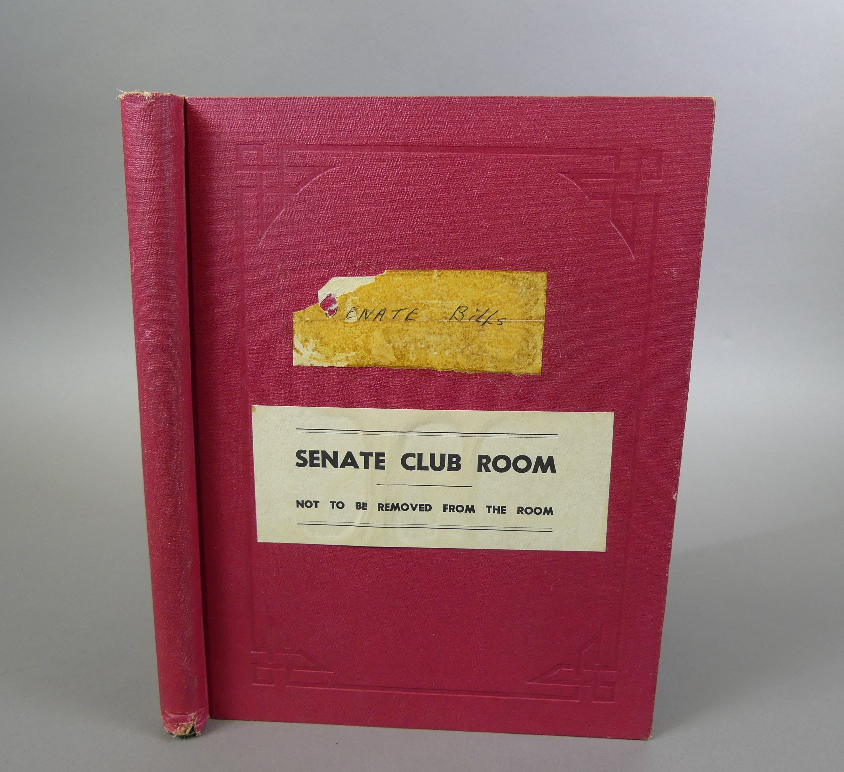 Red Senate Club Room Senate bills book with the instructions 'Not to be removed from the room' on the cover.