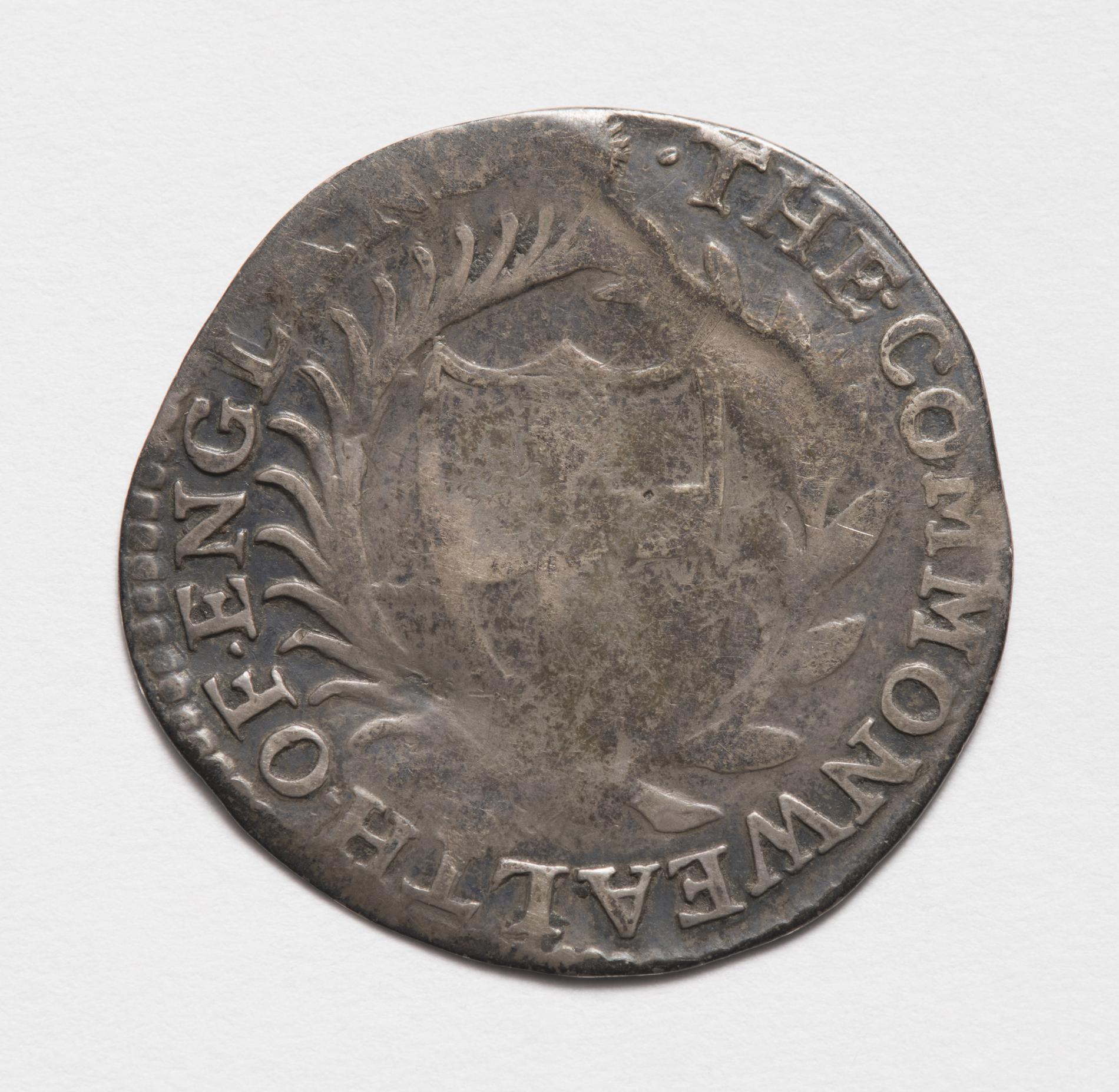 Photograph of a worn commonwealth sixpence