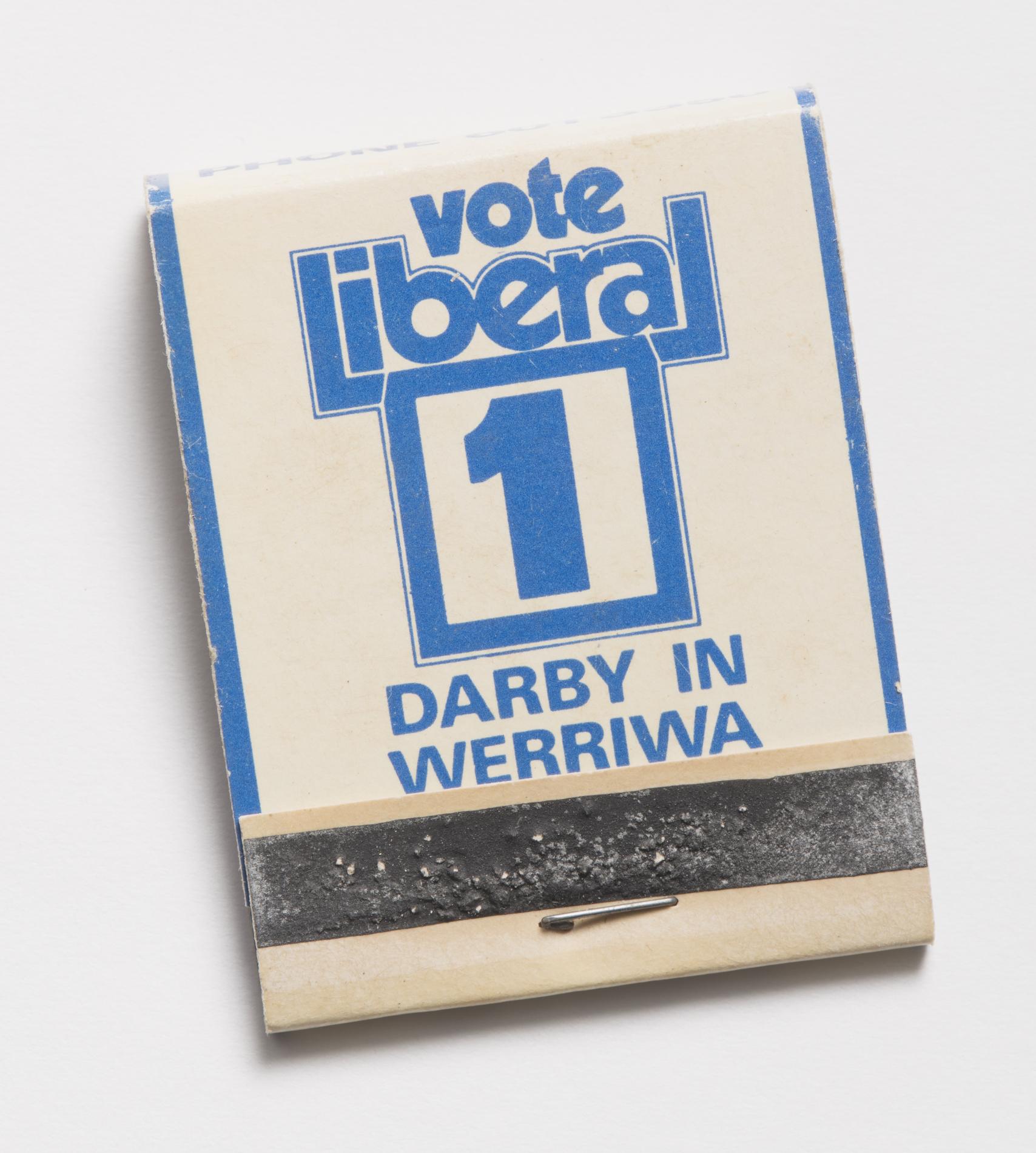 Photograph of a small matchbook reading "Vote liberal 1 Darby in Werriwa"