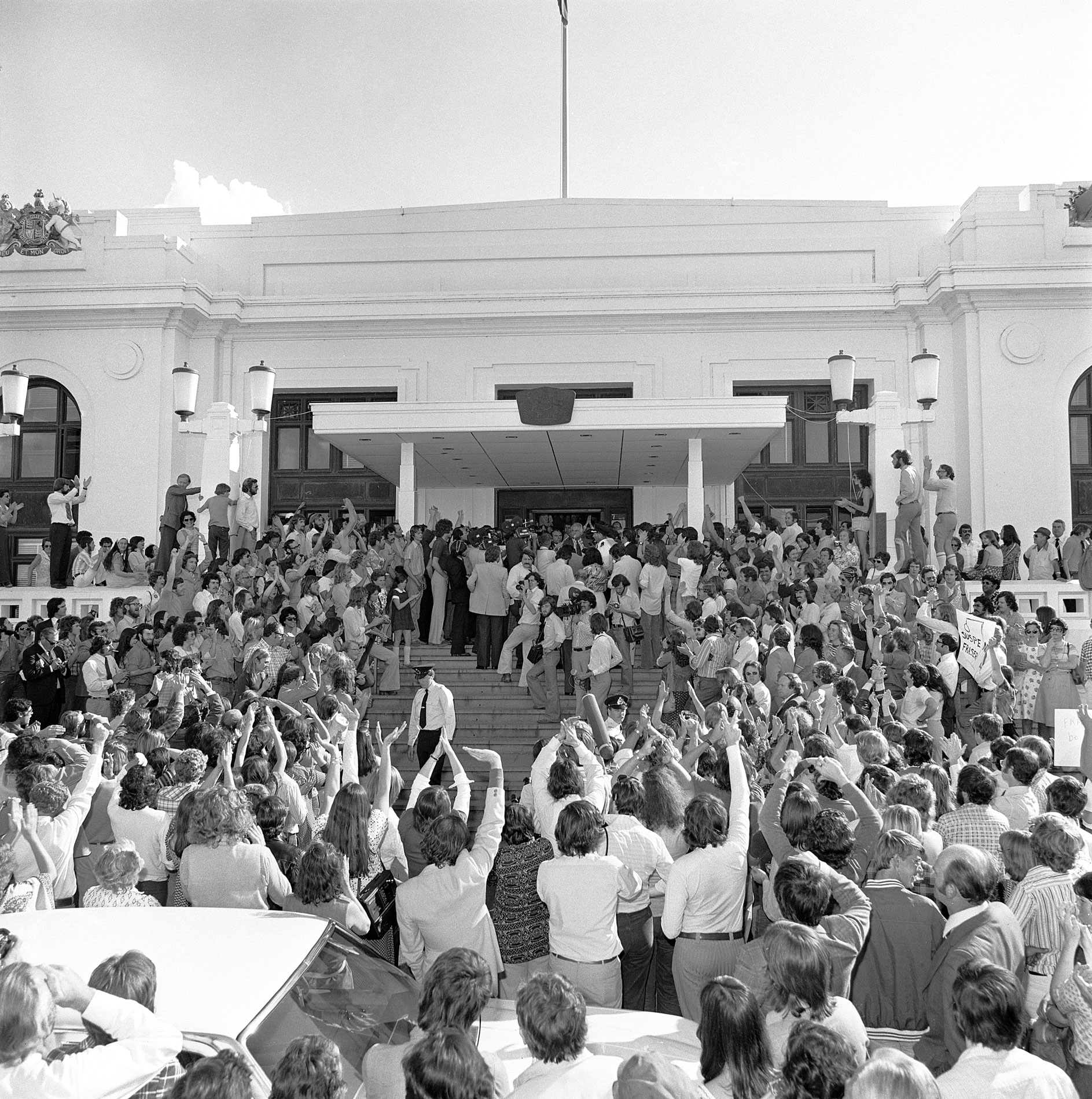 Crowds and press outside Parliament House following the dissolution of parliament.