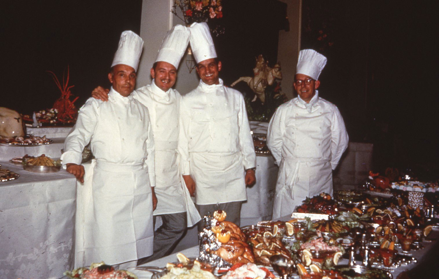 Head Chef Jim Barritt-Eyles and his staff with banquet fare in Old Parliament House
