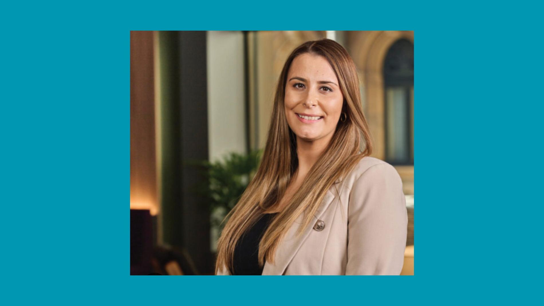 Photo of storyteller and educator Kylie Captain against a teal background.