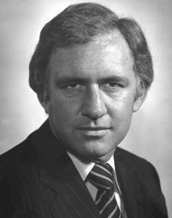 A black and white portrait image showing former politician Andrew Peacock.