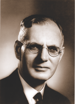 A scan of a black and white portrait image showing former prime minister John Curtin.