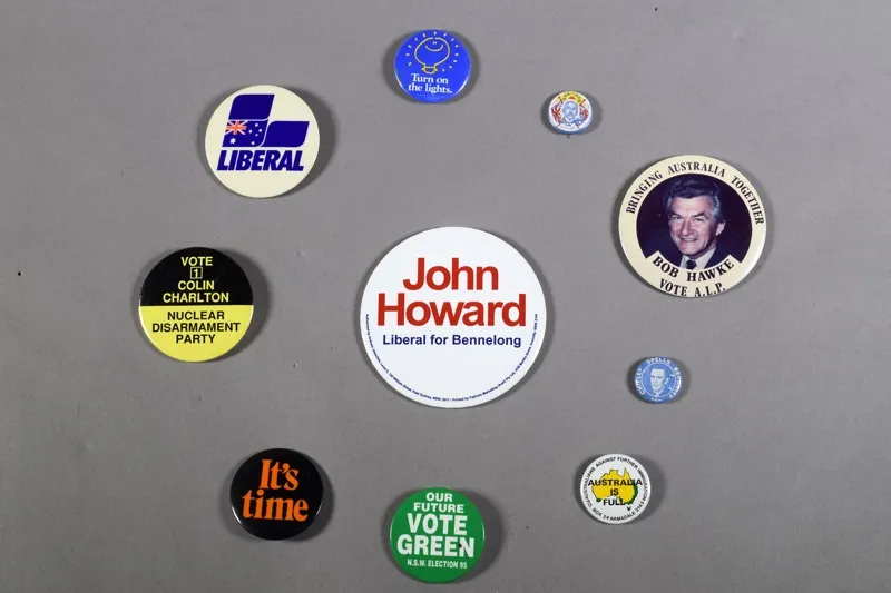 A selection of colourful election campaign badge from the ALP, Liberal party, Greens, Nuclear Disarmament Party and others.