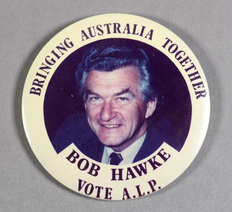Badge with Bob Hawke's face and the words 'Bringing Australia Together. Bob Hawke. Vote A.L.P.'