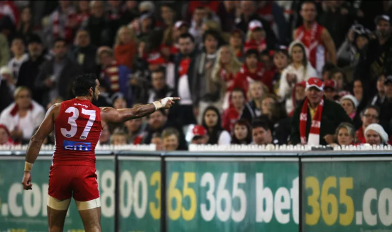 Adam Goodes pointing to a young Collingwood supporter