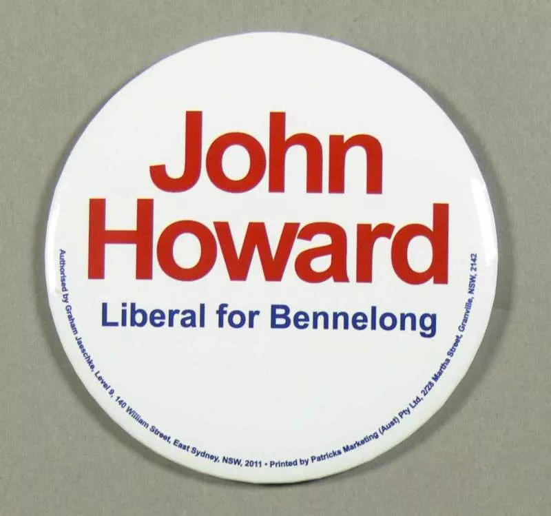 A photograph of John Howards election badge