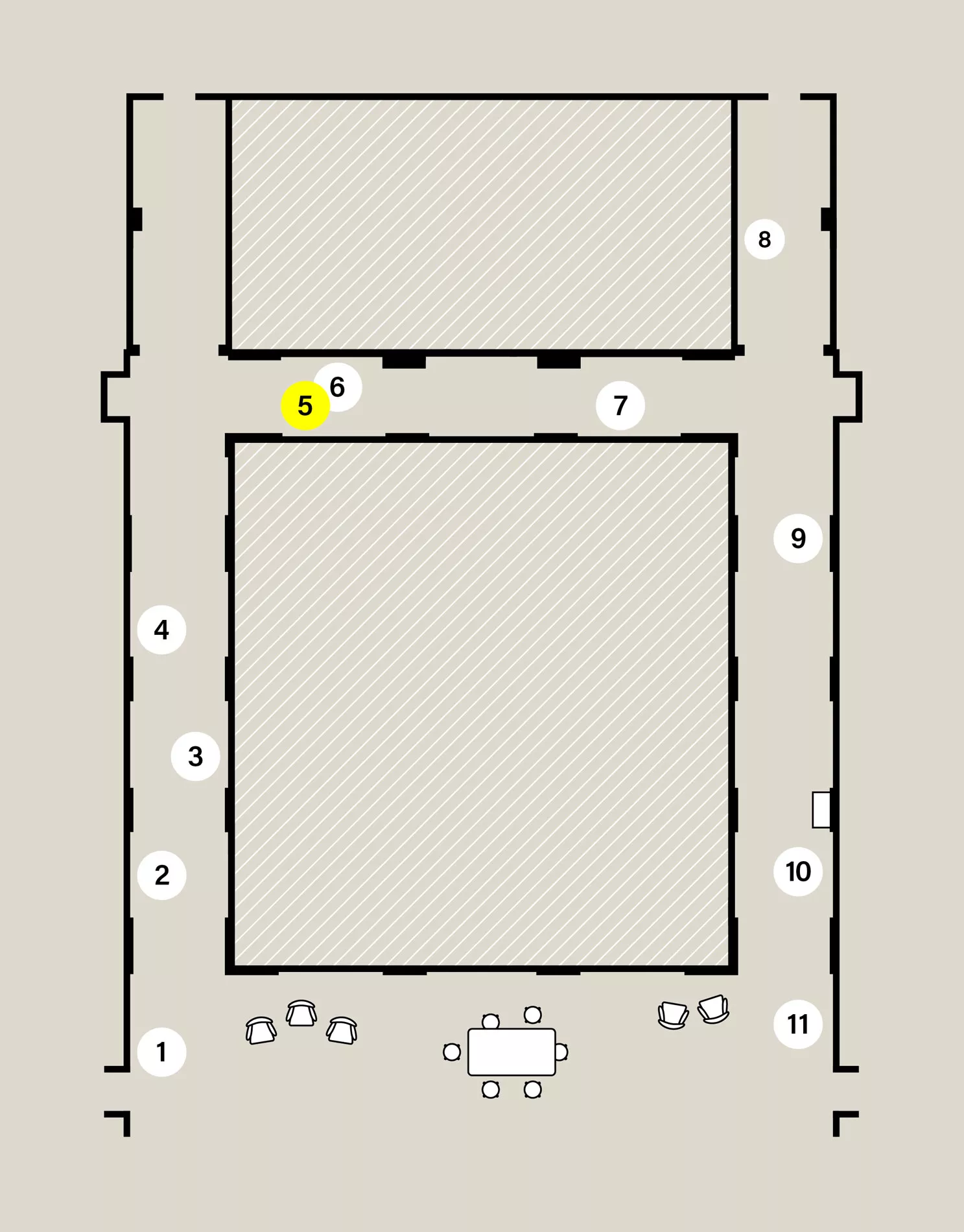 Map of a capital H-shaped exhibition space. Eleven numbered white circles show the location of stops on the audio tour. Stop 5 is highlighted yellow.