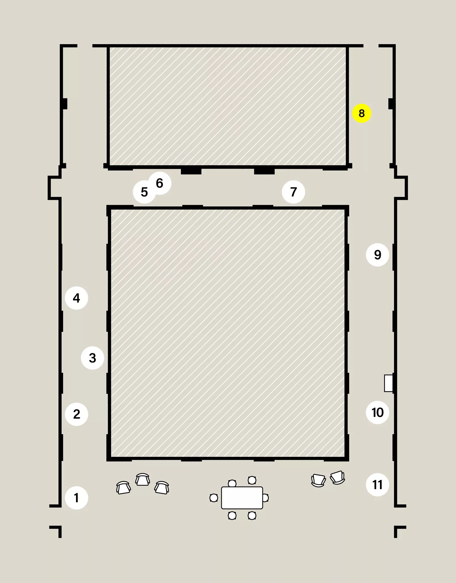 Map of a capital H-shaped exhibition space. Eleven numbered white circles show the location of stops on the audio tour. Stop 8 is highlighted yellow.