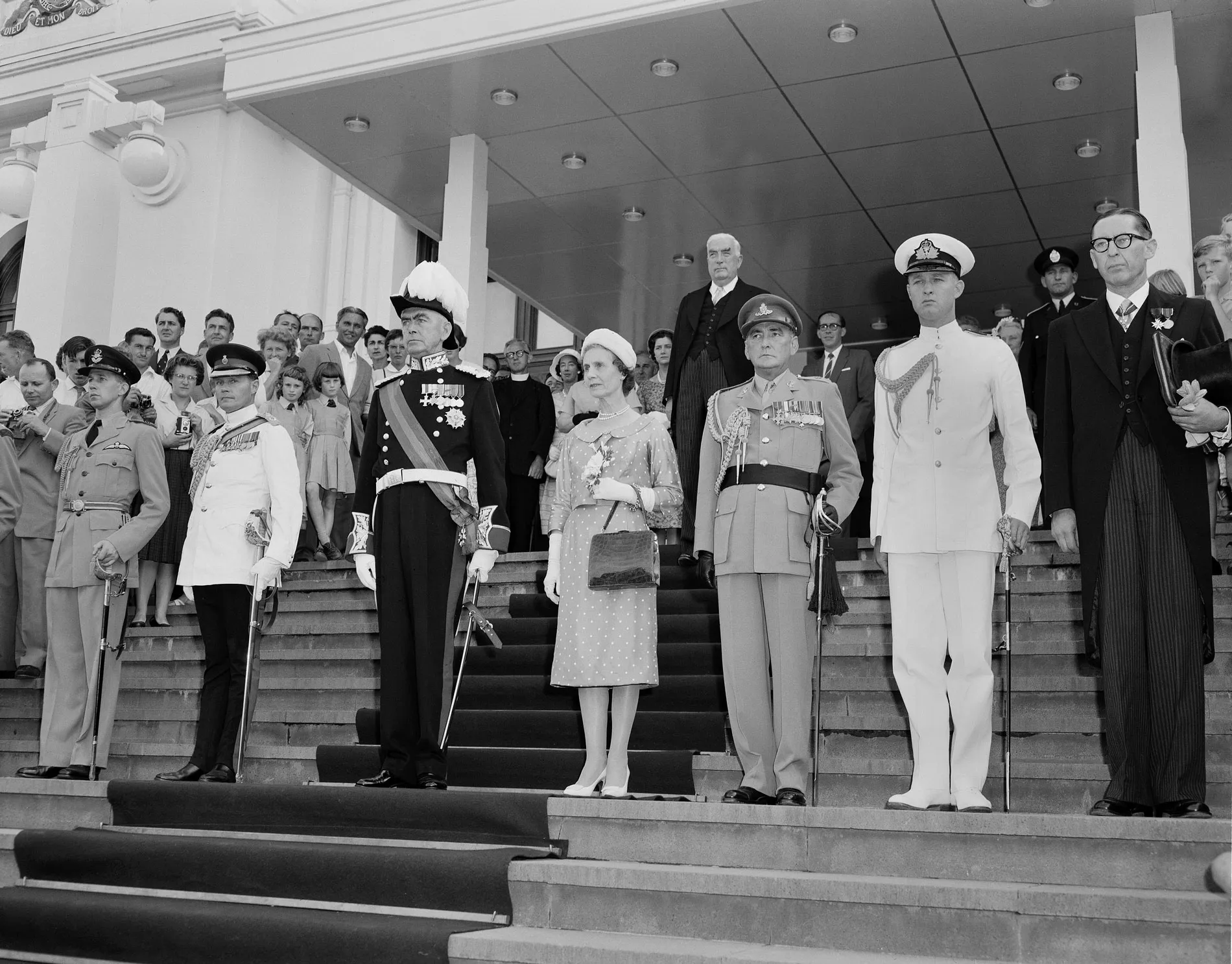 Viscount and Viscountess Dunrossil stand on the steps of Old Parliament House with other dignitaries including Sir Robert Menzies. Viscount and Viscountess Dunrossil stand on the steps of Old Parliament House with other dignitaries including Sir Robert Menzies.