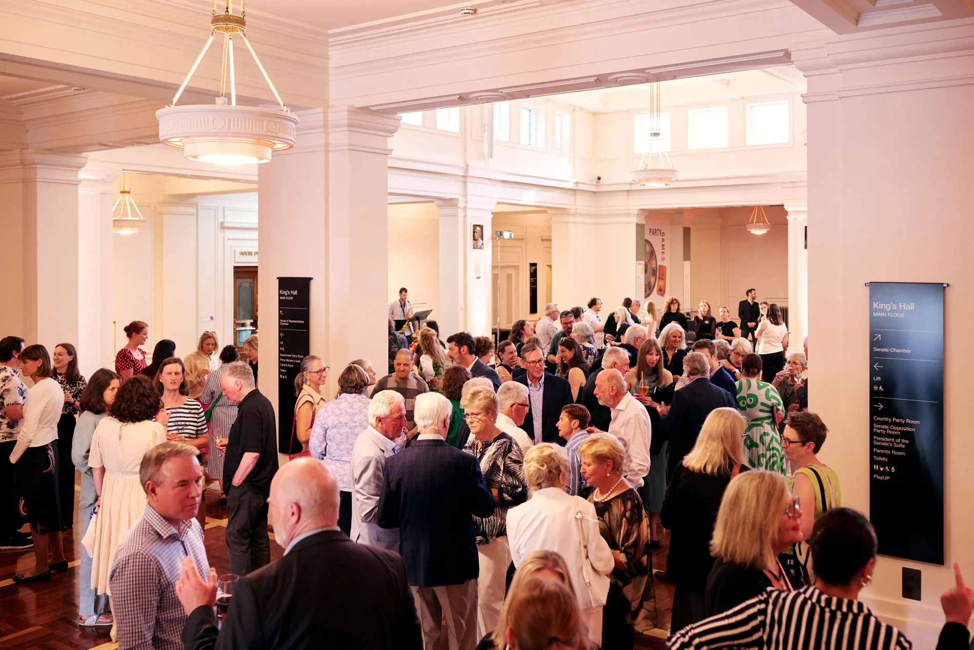 A large crowd gathered in King's Hall at Old Parliament House.