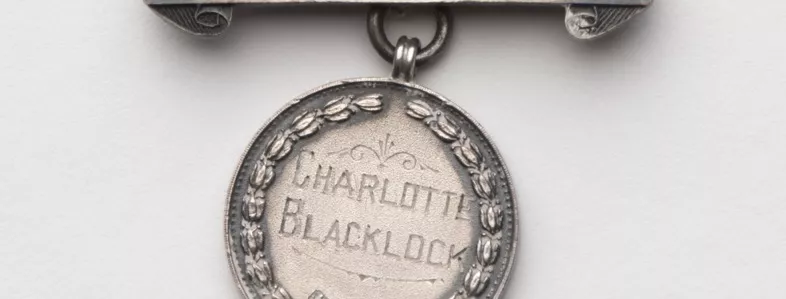 Photograph of a medallion labled "Charlotte Blacklock"