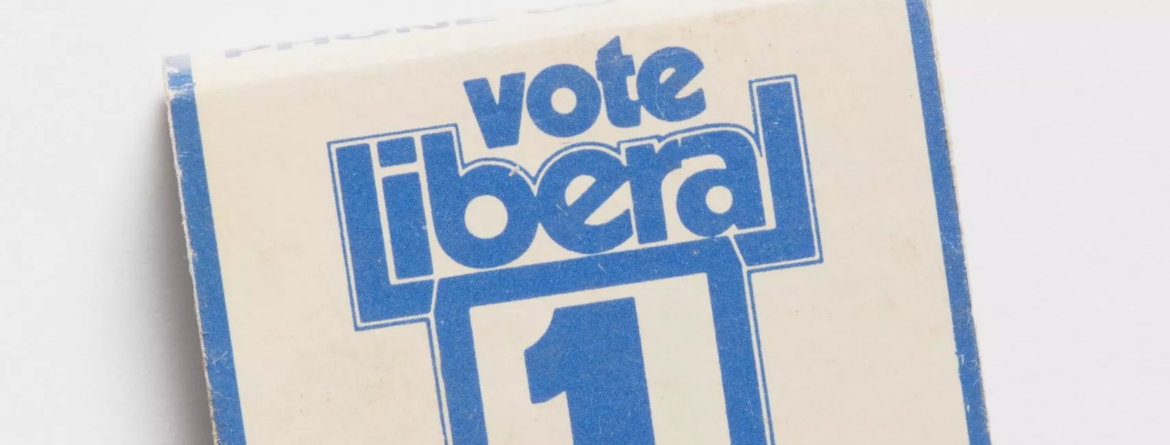 Photograph of a small matchbook reading "Vote liberal 1 Darby in Werriwa"