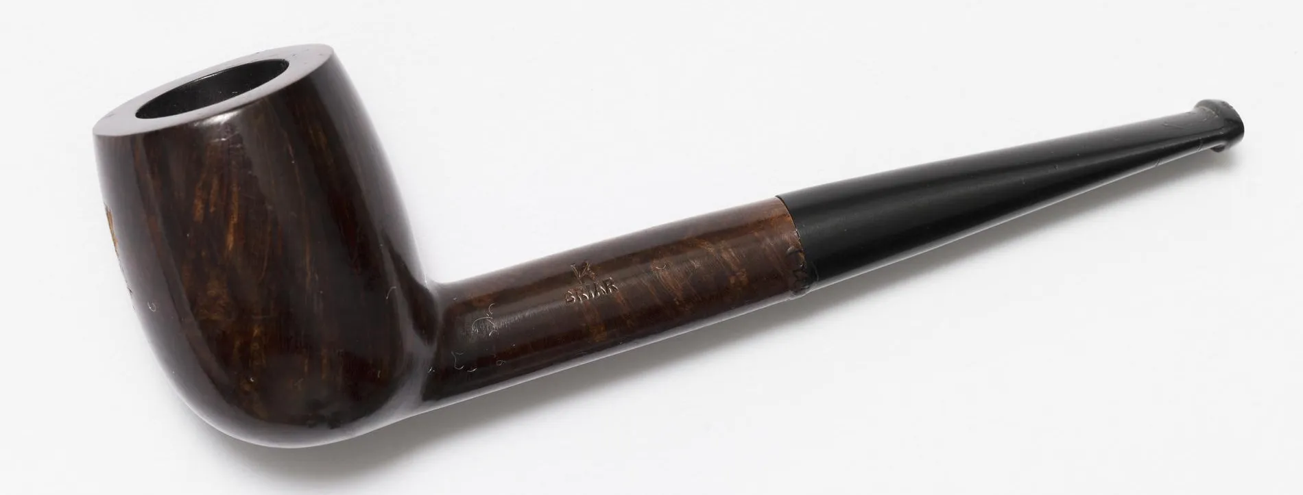 An old tobacco pipe that belonged to Ben Chifley, featuring an engraving that says 'GRIAR'