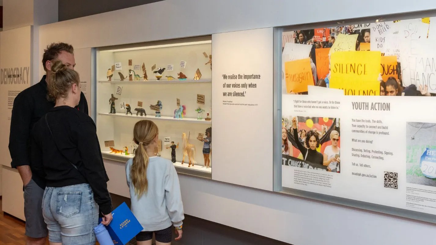 Visitors viewing a section of the exhibition