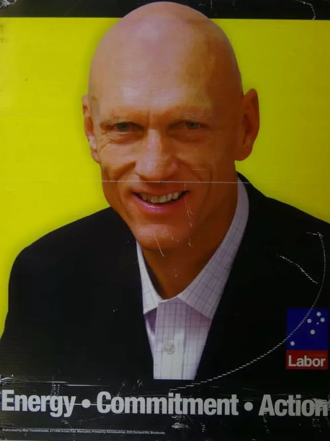 Peter Garrett corflute, 2007. Museum of Australian Democracy collection. Election corflute sign with Peter Garrett and the words 'Energy, Commitment, Action'.