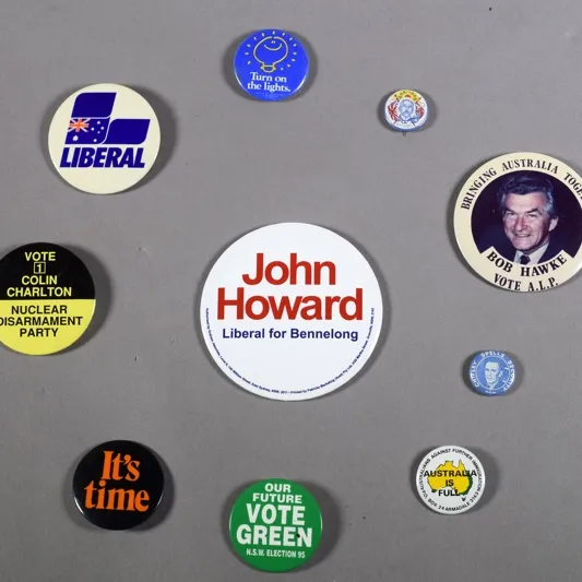 A selection of colourful election campaign badge from the ALP, Liberal party, Greens, Nuclear Disarmament Party and others.