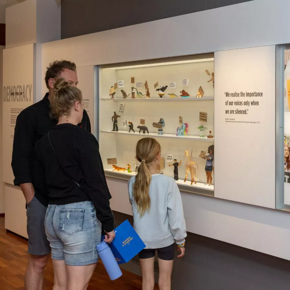 Visitors viewing a section of the exhibition