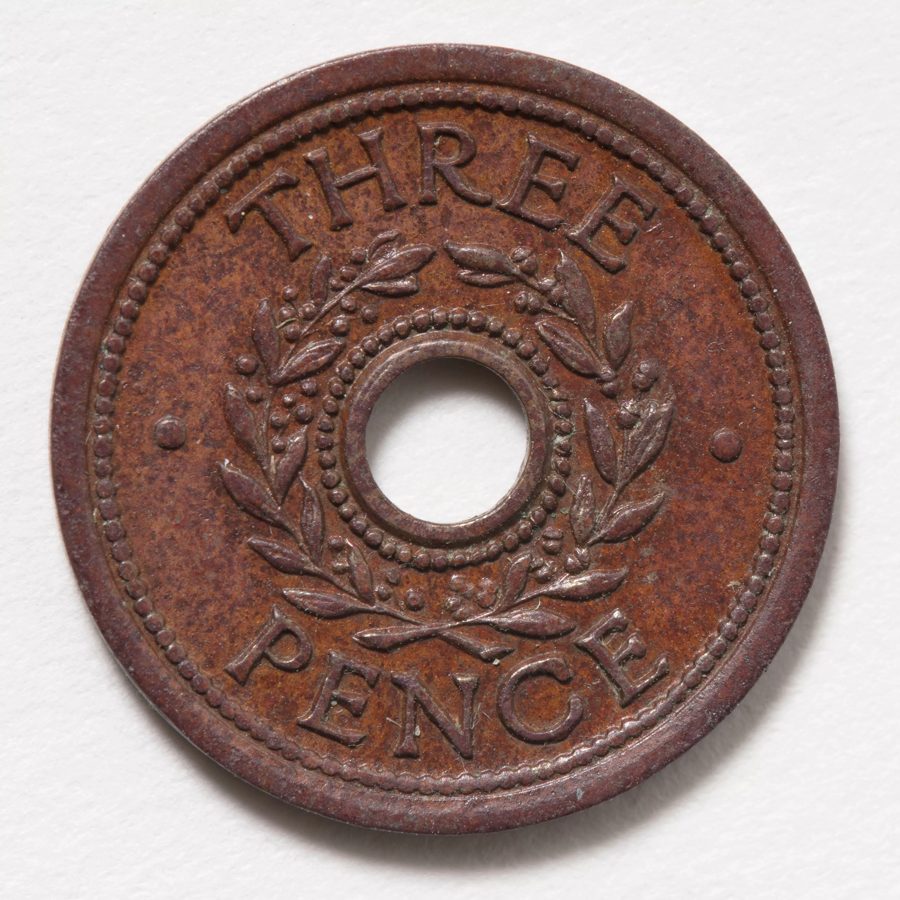 Threepenny internment camp tokens