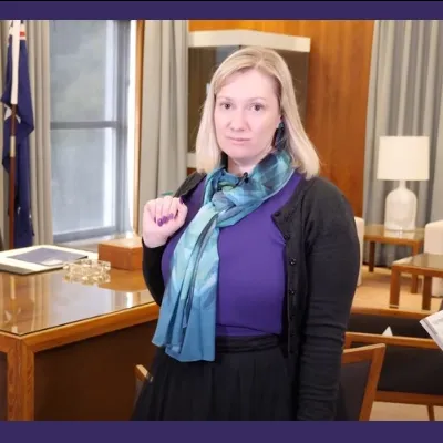 A women stands in the recreated Australian prime minister's office at Old Parliament House.