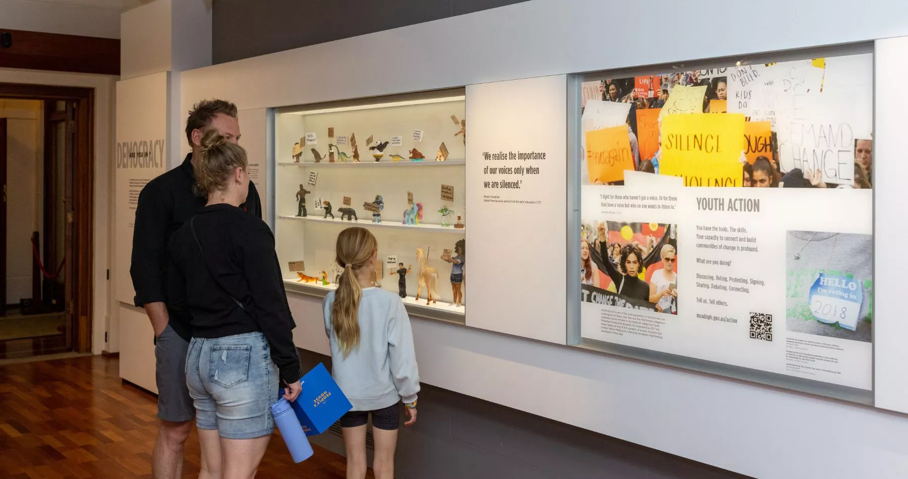 Visitors viewing a section of the exhibition