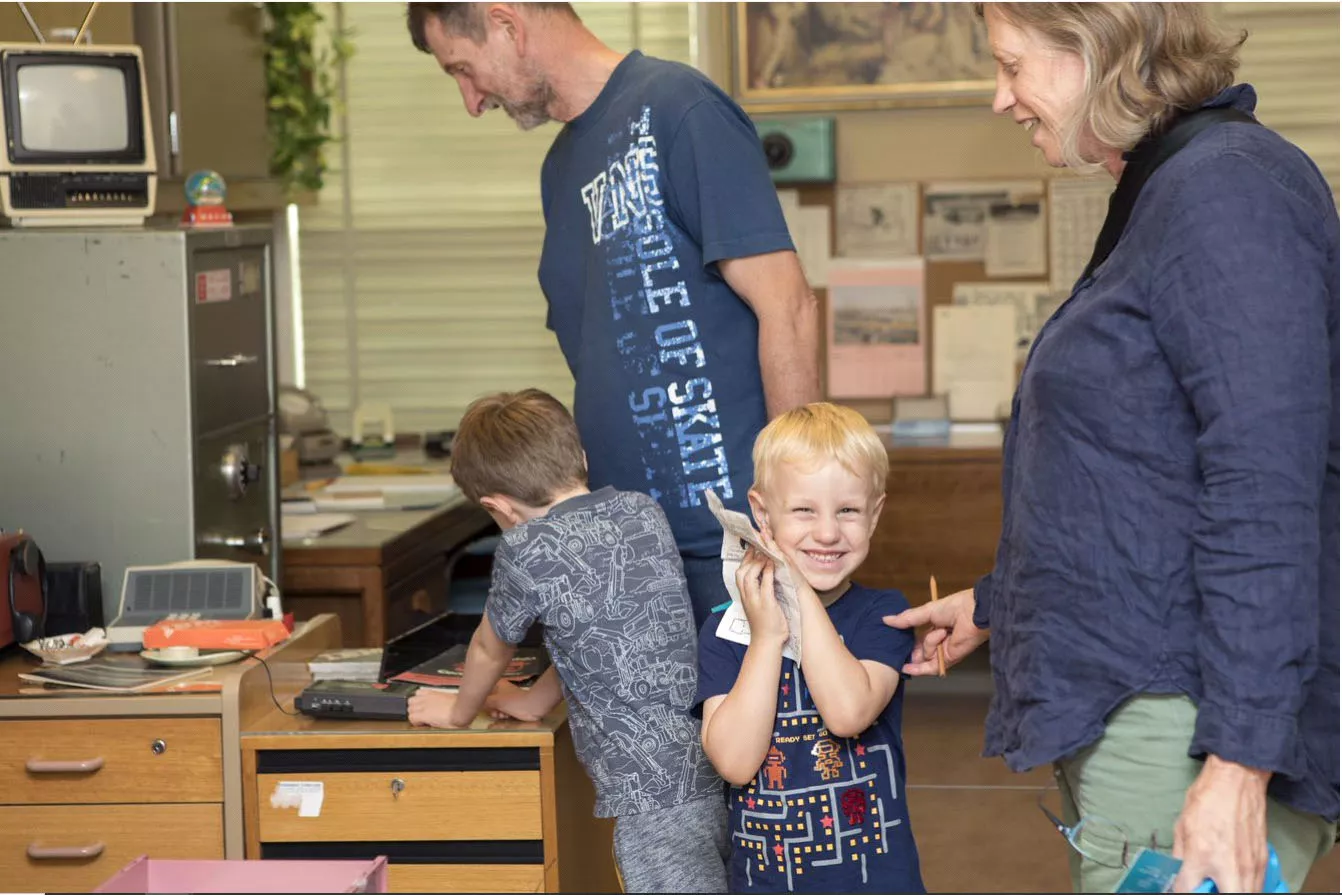 A family investigating one of the exhibitions